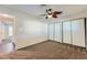 Bedroom featuring a ceiling fan and a closet with sliding doors and neutral carpet floors at 3557 Wayne Cir, Las Vegas, NV 89121