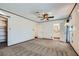 This bedroom has neutral carpet and access to an ensuite bathroom and closet at 3557 Wayne Cir, Las Vegas, NV 89121