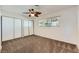 Bedroom featuring a ceiling fan and natural light from a window with views of the outdoors at 3557 Wayne Cir, Las Vegas, NV 89121