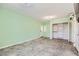 This bedroom features modern tile floor, built in closet and access to another room at 3557 Wayne Cir, Las Vegas, NV 89121