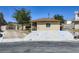 Charming home with a well-maintained front yard and a spacious driveway for easy access at 3557 Wayne Cir, Las Vegas, NV 89121
