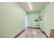 This hallway features modern tile floor and light green colored walls at 3557 Wayne Cir, Las Vegas, NV 89121