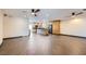 A spacious open-concept living area flows into the kitchen with dark appliances and ample cabinet space at 3557 Wayne Cir, Las Vegas, NV 89121