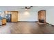 Spacious living room featuring tile floors, a brick fireplace, and an open layout at 3557 Wayne Cir, Las Vegas, NV 89121