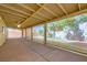 Extended patio with screen shades and views of the backyard at 3557 Wayne Cir, Las Vegas, NV 89121