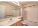 Bathroom featuring a single vanity, a shower and tub combination with a curtain for privacy at 3640 Shanagolden St, Las Vegas, NV 89129