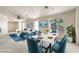 Bright dining room with views to the living room, modern furnishings, and natural light at 3640 Shanagolden St, Las Vegas, NV 89129