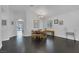 Open dining room featuring hardwood floors, bright natural light, and modern finishes at 4420 Loma Ct, Las Vegas, NV 89130