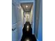 Long hallway showcasing hardwood floors and access to various rooms in the house at 4420 Loma Ct, Las Vegas, NV 89130