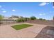 Backyard featuring a small patch of green artificial turf at 4498 Lantern Point Ave, North Las Vegas, NV 89084