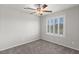 Well-lit bedroom with a ceiling fan and window with white shutter at 4498 Lantern Point Ave, North Las Vegas, NV 89084