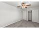 This bedroom has gray carpet and a door leading to a closet at 4498 Lantern Point Ave, North Las Vegas, NV 89084
