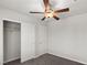 Bright bedroom with a ceiling fan and closet with white doors at 4498 Lantern Point Ave, North Las Vegas, NV 89084