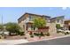 A two-story home with a well-maintained front yard on a sunny day at 4498 Lantern Point Ave, North Las Vegas, NV 89084