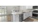 Bright kitchen featuring stainless steel appliances, granite countertops and sliding glass door at 4498 Lantern Point Ave, North Las Vegas, NV 89084