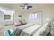 Bright bedroom featuring stylish decor and an adjoining bathroom with a double vanity at 4683 Monterey Cir # 4, Las Vegas, NV 89169