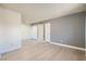 Spacious living room featuring neutral tones, new floors, and abundant natural light at 4683 Monterey Cir # 4, Las Vegas, NV 89169