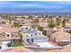 Charming two-story home with a three-car garage, solar panels, and mountain views in a residential neighborhood at 511 Beaconwood St, Henderson, NV 89052