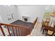 Bright living room with fireplace, hardwood floors and adjacent dining area at 511 Beaconwood St, Henderson, NV 89052