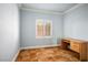 Home office with neutral walls, tiled floors, and a practical desk at 511 Beaconwood St, Henderson, NV 89052