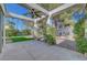 Open back patio with landscaping and a ceiling fan for outdoor entertainment at 5224 Painted Lakes Way, Las Vegas, NV 89149