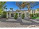 Cozy backyard with patio, gravel, and artificial grass at 5224 Painted Lakes Way, Las Vegas, NV 89149