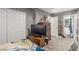 Neutral bedroom with closet, dresser, and TV at 5301 River Glen Dr # 205, Las Vegas, NV 89103