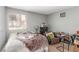 Bedroom with a window, chair, and desk at 5301 River Glen Dr # 205, Las Vegas, NV 89103