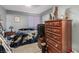 Bedroom features a dresser and closet space at 5301 River Glen Dr # 205, Las Vegas, NV 89103