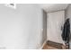A well-lit entryway featuring neutral colors and a coat rack at 5301 River Glen Dr # 205, Las Vegas, NV 89103