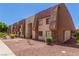 Attractive multi-Gathering residential exterior featuring a stone facade and well-maintained landscaping at 5301 River Glen Dr # 205, Las Vegas, NV 89103