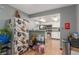 Open floorplan showing kitchen with white cabinets and appliances at 5301 River Glen Dr # 205, Las Vegas, NV 89103
