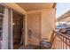 A private patio features outdoor storage and a shaded seating area at 5301 River Glen Dr # 205, Las Vegas, NV 89103