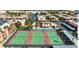 Enjoy outdoor activities with community tennis courts in a well-kept neighborhood, surrounded by palm trees and residences at 5301 River Glen Dr # 205, Las Vegas, NV 89103