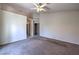 Spacious bedroom with adjacent bathroom and carpet at 5425 Thomaston Ct, Las Vegas, NV 89122