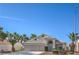 Attractive single-story home featuring desert landscaping and a tile roof under a clear blue sky at 5425 Thomaston Ct, Las Vegas, NV 89122