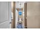 Narrow bathroom featuring a toilet, vanity, and a small window for natural light at 582 Brompton St, Las Vegas, NV 89178