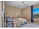 Bedroom with a window view, neutral walls, and carpet flooring at 582 Brompton St, Las Vegas, NV 89178