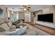 Bright living room with contemporary decor, comfortable seating, and hardwood flooring at 582 Brompton St, Las Vegas, NV 89178
