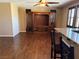 Spacious living room with hardwood floors and a built-in entertainment center at 585 Via Alhambra, Las Vegas, NV 89123