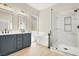 Modern bathroom featuring a freestanding tub, walk-in shower and stylish vanity at 5908 Big Horn View St, North Las Vegas, NV 89031