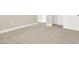Bedroom featuring neutral carpeting, baseboards, and fresh paint at 5908 Big Horn View St, North Las Vegas, NV 89031