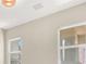 Interior ceiling with a light fixture and windows allowing ample natural light at 5908 Big Horn View St, North Las Vegas, NV 89031