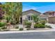 Inviting single-story house with desert landscaping and a stone-accented facade at 5908 Big Horn View St, North Las Vegas, NV 89031