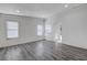 Spacious living room with hardwood floors and lots of natural light at 6109 W Oakey Blvd # C, Las Vegas, NV 89146