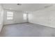 Spacious bedroom with two windows that provide lots of natural light at 6370 Ava Ridge Ave, Las Vegas, NV 89141