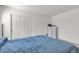 Bedroom with neutral carpet, white walls, and closet with sliding doors at 6370 Ava Ridge Ave, Las Vegas, NV 89141