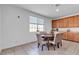 Cozy dining area with tile flooring, and window offering natural light at 6370 Ava Ridge Ave, Las Vegas, NV 89141