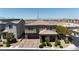 Charming two-story home with a neutral color scheme, a two-car garage, and a well-manicured front yard at 6370 Ava Ridge Ave, Las Vegas, NV 89141