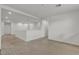 Large, light-filled open loft area with carpeted floors at 6370 Ava Ridge Ave, Las Vegas, NV 89141